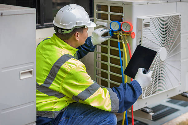 Professional Heat Pump Repair technician working in Martinsville, VA
